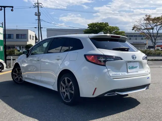 トヨタ カローラツーリング ダブルバイビー 鳥取県 2020(令2)年 5.8万km ホワイトパールクリスタルシャイン 純正9インチナビ/フルセグ/BT/USB/バックカメラ/トヨタセーフティセンス/レーンキープアシスト/レーダークルーズコントロール/ブラインドスポットモニター/ビルトインETC２．０/ハーフレザーシート/LEDヘットライト/オートハイビーム/ENKEI 17インチアルミホイール/プッシュエンジンスタート/スマートキー×２
