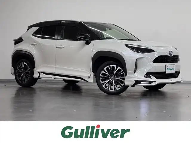 トヨタ ヤリスクロス ハイブリッド Z 三重県 2021(令3)年 6.4万km ブラックマイカ/ホワイトパールクリスタルシャイン 2トーン ハイブリッド/FF/フロアCVT/純正 8インチナビ*/（AM/FM/USB/iPod/Bluetooth/Miracast/TV/CarPlay/AndroidAuto）/パノラミックビューモニター*/ドライブレコーダー 前方/ETC/モデリスタエアロ『アドバンス・ロバスト・スタイル』（F/S/R下）/Toyota Safety Sense/・プリクラッシュセーフティ/・レーントレーシングアシスト/・レーダークルコン（全車速追従機能付）/・アダプティブハイビームシステム*/・ロードサインアシスト/・インテリジェントクリアランスソナー［パーキングサポートブレーキ（静止物＆後方接近車両）］/・トヨタ チームメイト［アドバンスト パーク］*/・ブラインドスポットモニター＆リヤクロストラフィックアラート/・先行車発進告知機能/など/装備/・ハンズフリーパワーバックドア*/・カラーヘッドアップディスプレイ*/・ハーフレザーシート/・シートヒーター（D/N）/・パワーシート（D6way）/・オートエアコン/・オートライト/・LEDヘッドランプ/・ステアリングスイッチ/・電子パーキングブレーキ＆ブレーキホールド/・純正18inAW/・保/取/ナビ取/・スマートキーx1/など/*…メーカーOP
