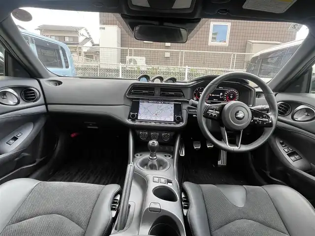 日産 フェアレディ Ｚ バージョンST 熊本県 2025(令7)年 1.2万km 黒 ワンオーナー/プッシュスタート/純正ナビ/BOSEサウンド/バックカメラ/ビルトインETC/純正19インチAW/純正キャリパー/レーダークルーズ/ハーフレザーシート/全席パワーシート/全席シートヒーター/3連メーター/LEDヘッドライト/オートライト/フォグライト/前後コーナーセンサー/横滑り防止装置/ウィンカーミラー/新車保証書/取扱説明書/スマートスペアキー×1本/カラー番号：GAT