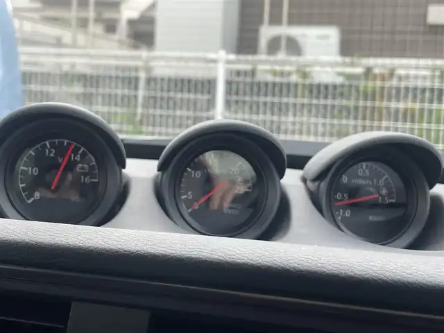 日産 フェアレディ Ｚ バージョンST 熊本県 2025(令7)年 1.2万km 黒 ワンオーナー/プッシュスタート/純正ナビ/BOSEサウンド/バックカメラ/ビルトインETC/純正19インチAW/純正キャリパー/レーダークルーズ/ハーフレザーシート/全席パワーシート/全席シートヒーター/3連メーター/LEDヘッドライト/オートライト/フォグライト/前後コーナーセンサー/横滑り防止装置/ウィンカーミラー/新車保証書/取扱説明書/スマートスペアキー×1本/カラー番号：GAT