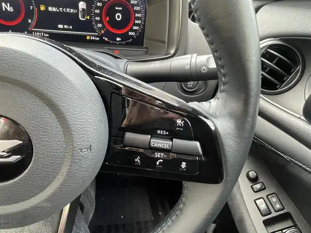 日産 フェアレディ Ｚ バージョンST 熊本県 2025(令7)年 1.2万km 黒 ワンオーナー/プッシュスタート/純正ナビ/BOSEサウンド/バックカメラ/ビルトインETC/純正19インチAW/純正キャリパー/レーダークルーズ/ハーフレザーシート/全席パワーシート/全席シートヒーター/3連メーター/LEDヘッドライト/オートライト/フォグライト/前後コーナーセンサー/横滑り防止装置/ウィンカーミラー/新車保証書/取扱説明書/スマートスペアキー×1本/カラー番号：GAT