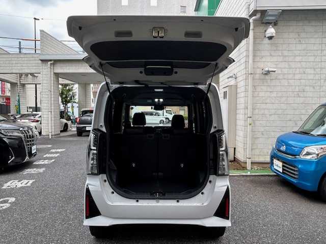 ダイハツ タント カスタム RS 長崎県 2023(令5)年 0.8万km シャイニングホワイトパール 登録時走行7728km/ワンオーナー/スマートアシスト/・衝突回避支援ブレーキ機能/・衝突警報機能/・ブレーキ制御付誤発進抑制機能/・車線逸脱警報機能/・車線逸脱抑制制御機能/・路側逸脱警報機能/・ふらつき警報/・先行車発進お知らせ機能/・標識認識機能（進入禁止/最高速度/一時停止）/・アダプティブドライビングビーム/・コーナーセンサー/スマートパノラマパーキングパック/・スマートパノラマパーキングアシスト（フロント/サイド/バックカメラ）/・ドアミラーヒーター/・助手席側サイドアンダーミラー/・ステアリングスイッチ（駐車支援）/純正ディスプレイオーディオ/フルセグTV/ビルトインETC2.0/ドライブレコーダー/両側パワースライドドア/LEDライト/ハーフレザーシート（合皮）/前席シートヒーター/eco IDLE/メッキフロントグリル（08400-K2379)/保証書・取説/スペアキー