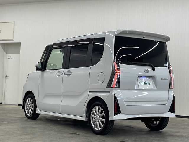 ダイハツ タント カスタム RS 長崎県 2023(令5)年 0.8万km シャイニングホワイトパール 登録時走行7728km/ワンオーナー/スマートアシスト/・衝突回避支援ブレーキ機能/・衝突警報機能/・ブレーキ制御付誤発進抑制機能/・車線逸脱警報機能/・車線逸脱抑制制御機能/・路側逸脱警報機能/・ふらつき警報/・先行車発進お知らせ機能/・標識認識機能（進入禁止/最高速度/一時停止）/・アダプティブドライビングビーム/・コーナーセンサー/スマートパノラマパーキングパック/・スマートパノラマパーキングアシスト（フロント/サイド/バックカメラ）/・ドアミラーヒーター/・助手席側サイドアンダーミラー/・ステアリングスイッチ（駐車支援）/純正ディスプレイオーディオ/フルセグTV/ビルトインETC2.0/ドライブレコーダー/両側パワースライドドア/LEDライト/ハーフレザーシート（合皮）/前席シートヒーター/eco IDLE/メッキフロントグリル（08400-K2379)/保証書・取説/スペアキー
