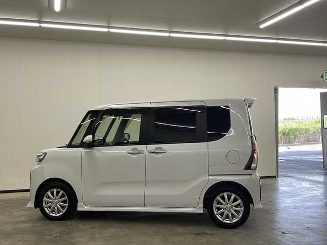 ダイハツ タント カスタム RS 長崎県 2023(令5)年 0.8万km シャイニングホワイトパール 登録時走行7728km/ワンオーナー/スマートアシスト/・衝突回避支援ブレーキ機能/・衝突警報機能/・ブレーキ制御付誤発進抑制機能/・車線逸脱警報機能/・車線逸脱抑制制御機能/・路側逸脱警報機能/・ふらつき警報/・先行車発進お知らせ機能/・標識認識機能（進入禁止/最高速度/一時停止）/・アダプティブドライビングビーム/・コーナーセンサー/スマートパノラマパーキングパック/・スマートパノラマパーキングアシスト（フロント/サイド/バックカメラ）/・ドアミラーヒーター/・助手席側サイドアンダーミラー/・ステアリングスイッチ（駐車支援）/純正ディスプレイオーディオ/フルセグTV/ビルトインETC2.0/ドライブレコーダー/両側パワースライドドア/LEDライト/ハーフレザーシート（合皮）/前席シートヒーター/eco IDLE/メッキフロントグリル（08400-K2379)/保証書・取説/スペアキー