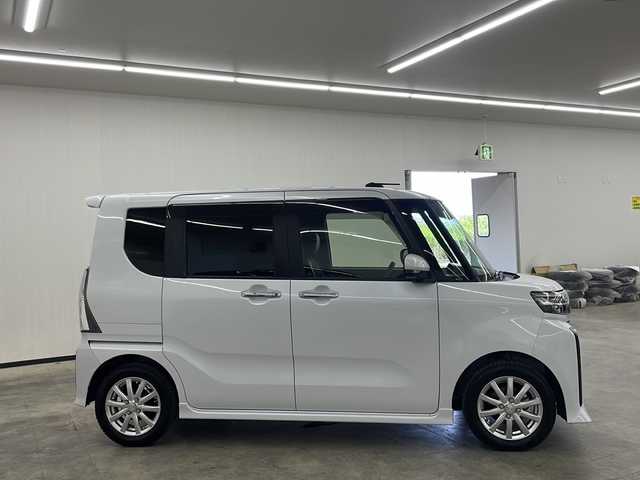 ダイハツ タント カスタム RS 長崎県 2023(令5)年 0.8万km シャイニングホワイトパール 登録時走行7728km/ワンオーナー/スマートアシスト/・衝突回避支援ブレーキ機能/・衝突警報機能/・ブレーキ制御付誤発進抑制機能/・車線逸脱警報機能/・車線逸脱抑制制御機能/・路側逸脱警報機能/・ふらつき警報/・先行車発進お知らせ機能/・標識認識機能（進入禁止/最高速度/一時停止）/・アダプティブドライビングビーム/・コーナーセンサー/スマートパノラマパーキングパック/・スマートパノラマパーキングアシスト（フロント/サイド/バックカメラ）/・ドアミラーヒーター/・助手席側サイドアンダーミラー/・ステアリングスイッチ（駐車支援）/純正ディスプレイオーディオ/フルセグTV/ビルトインETC2.0/ドライブレコーダー/両側パワースライドドア/LEDライト/ハーフレザーシート（合皮）/前席シートヒーター/eco IDLE/メッキフロントグリル（08400-K2379)/保証書・取説/スペアキー