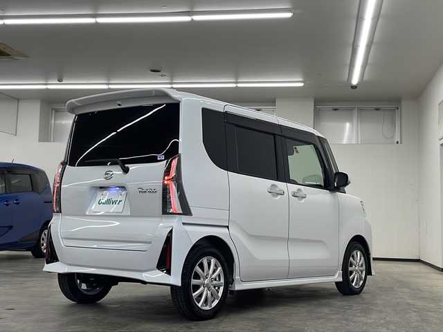 ダイハツ タント カスタム RS 長崎県 2023(令5)年 0.8万km シャイニングホワイトパール 登録時走行7728km/ワンオーナー/スマートアシスト/・衝突回避支援ブレーキ機能/・衝突警報機能/・ブレーキ制御付誤発進抑制機能/・車線逸脱警報機能/・車線逸脱抑制制御機能/・路側逸脱警報機能/・ふらつき警報/・先行車発進お知らせ機能/・標識認識機能（進入禁止/最高速度/一時停止）/・アダプティブドライビングビーム/・コーナーセンサー/スマートパノラマパーキングパック/・スマートパノラマパーキングアシスト（フロント/サイド/バックカメラ）/・ドアミラーヒーター/・助手席側サイドアンダーミラー/・ステアリングスイッチ（駐車支援）/純正ディスプレイオーディオ/フルセグTV/ビルトインETC2.0/ドライブレコーダー/両側パワースライドドア/LEDライト/ハーフレザーシート（合皮）/前席シートヒーター/eco IDLE/メッキフロントグリル（08400-K2379)/保証書・取説/スペアキー