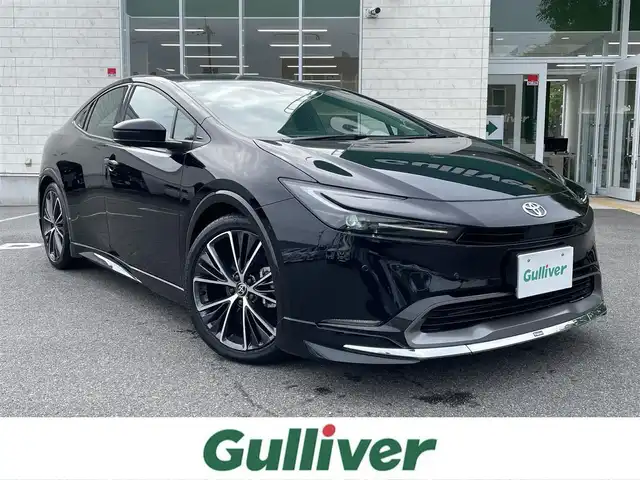 トヨタ プリウス Z 鳥取県 2023(令5)年 1.4万km アティチュードブラックマイカ トヨタセーフティセンス/モデリスタエアロ/パノラマルーフ/12.3型ディスプレィオーディオ/・フルセグ/・Bluetooth/パノラミックビューモニター/ブラインドスポットモニター/デジタルインナーミラー/パワーバックドア/合皮レザーシート/前席パワーシート/シートヒーター/ベンチレーション/ワイヤレス充電/LEDヘッドライト/オートマチックハイビーム/W＆サイドエアバック/カーテンエアバック