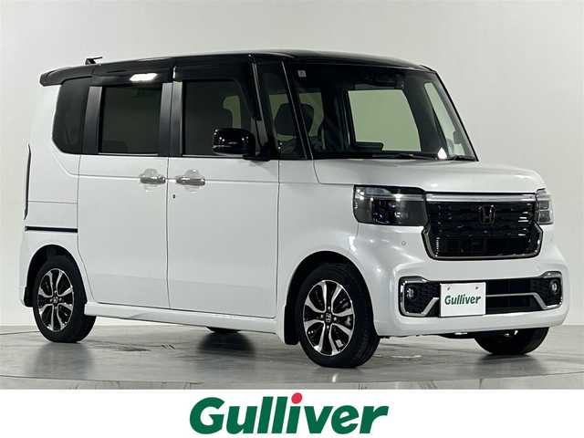 ホンダ Ｎ ＢＯＸ カスタム コーディネートスタイル 佐賀県 2024(令6)年 1.9万km プラチナホワイトパール 純正9インチホンダGathersナビ/フルセグTV/DVD/CD/Bluetooth/バックカメラ/衝突被害軽減システム/レーダークルーズコントロール/レーンアシスト/クリアランスソナー/先行車発進告知機能/ロードサインアシスト/オートライト/オートマチックハイビーム/電子パーキング/ブレーキホールド/カーテンエアバッグ/LED ヘッドライト/フォグライト/両側パワースライドドア/前方ドライブレコーダー/ビルトインEETC/後席サンシェード/シートバックテーブル/運転席・助手席シートヒーター/ISOFIX対応シート/合皮シート/純正14インチアルミホイール/純正フロアマット/ステアリングスイッチ/ウィンカーミラー