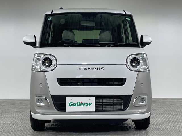 ダイハツ ムーヴ キャンバス ストライプス G ターボ 神奈川県 2024(令6)年 0.6万km シャイニングホワイトパール/スムーズグレーマイカメタリック 純正7型SDナビゲーション【NMZK-W73D】/AM FM Bluetooth フルセグ CD DVD SD/パノラマモニター/両側パワースライドドア/スマートアシスト/先行車発進お知らせ機能/車線逸脱警報/標識認識/ふらつき警報/車線逸脱抑制/レーンキープコントロール/クリアランスソナー/前席シートヒーター/ステアリングリモコン/前方ドライブレコーダー/オートホールド/純正フロアマット/LEDヘッドライト/オートライト/オートマチックハイビーム/プッシュスタート/スマートキー/スペアキー