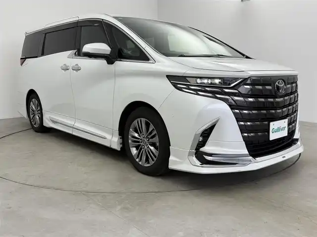 トヨタ アルファード Z 愛知県 2023(令5)年 1.9万km プラチナホワイトパールマイカ モデリスタフルエアロ（F.S.R）/純正14インチディスプレイナビ/フルセグTV/HDMI/Bluetooth/CarPlay/フリップダウンモニター/左右独立ムーンルーフ/トヨタチームメイト/・アドバンスドパーク＋パーキングサポートブレーキ/・アドバンスドドライブ（渋滞支援）/カラーヘッドアップディスプレイ/デジタルインナーミラー　/アラウンドビューモニター　　/トヨタセーフティセンス/・プリクラッシュセーフティ/・レーントレーシングアシスト/・アダプティブハイビームアシスト/レーダークルーズコントロール/ブラインドスポットモニター/ビルドインＥＴＣ２．０　/置くだけ充電　/ブラックレザーシート/パワーシート/シートヒーター/エアシート/AC100V/保証書/取扱説明書/スペアキー