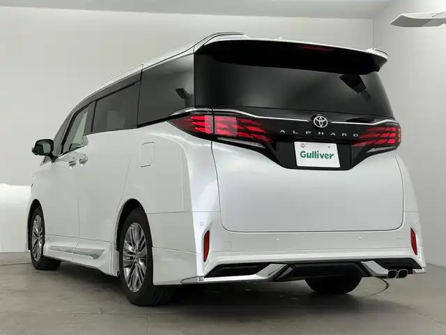 トヨタ アルファード Z 愛知県 2023(令5)年 1.9万km プラチナホワイトパールマイカ モデリスタフルエアロ（F.S.R）/純正14インチディスプレイナビ/フルセグTV/HDMI/Bluetooth/CarPlay/フリップダウンモニター/左右独立ムーンルーフ/トヨタチームメイト/・アドバンスドパーク＋パーキングサポートブレーキ/・アドバンスドドライブ（渋滞支援）/カラーヘッドアップディスプレイ/デジタルインナーミラー　/アラウンドビューモニター　　/トヨタセーフティセンス/・プリクラッシュセーフティ/・レーントレーシングアシスト/・アダプティブハイビームアシスト/レーダークルーズコントロール/ブラインドスポットモニター/ビルドインＥＴＣ２．０　/置くだけ充電　/ブラックレザーシート/パワーシート/シートヒーター/エアシート/AC100V/保証書/取扱説明書/スペアキー