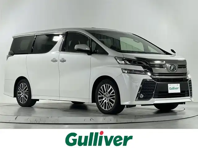 トヨタ ヴェルファイア Z Gエディション 佐賀県 2017(平29)年 6万km ホワイトパールクリスタルシャイン アルパイン製11インチナビ/フルセグTV/CD/DVD/Bluetooth/アルパイン製12.8インチフリップダウンモニター/サンルーフ/衝突被害軽減システム/バックカメラ/レーダークルーズコントロール/レーンアシスト/クリアランスソナー/オートライト/オートマチックハイビーム/LEDヘッドライト/LEDフォグライト/電子パーキング/ブレーキホールド/ビルトインETC/両側パワースライドドア/後席サンシェード/ハーフレザーシート/運転席・助手席パワーシート/パワーバックドア/純正18インチアルミホイール/純正フロアマット/ISOFIX対応シート/メモリーシート/スマートキー/スペアキー×1