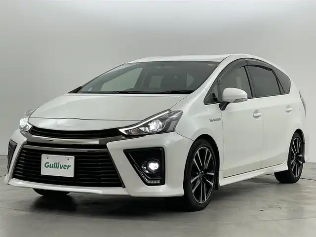 トヨタ プリウス α S ツーリングセレクション G’s 福岡県 2016(平28)年 1.7万km ホワイトパールクリスタルシャイン ＧＳ＇エアロ　純正ナビ／フルセグＴＶ／ＢＴ　/ビルトインＥＴＣ　/バックカメラ　/衝突被害軽減システム　/レーンキープ　/コーナーセンサー　/横滑り防止装置　/オートライト　/ＧＳ＇１８インチＡＷ　/ハーフレザーシート