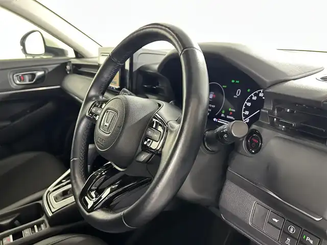 ホンダ ヴェゼル ハイブリッド e:HEV Z 佐賀県 2023(令5)年 7万km プラチナホワイトパール 社外7インチナビ/Bluetooth/バックカメラ/レーダークルーズコントロール/ブラインドスポットモニター/電動パーキングブレーキ/オートブレーキホールド/衝突被害軽減システム/コーナーセンサー/パワーバックドア/運転席シートヒーター/ステアリングヒーター/パドルシフト/純正18インチアルミホイール