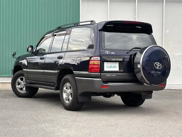トヨタ ランドクルーザー VX－LTD Gセレクション 福岡県 2001(平13)年 5.9万km ダークブルーマイカ 盗難防止装置/ナビ/ワンセグTV/４WD/ガラスルーフ/純正フロアマット/純正アルミホイール/背面タイヤ/アルカンターラシート/パワーシート