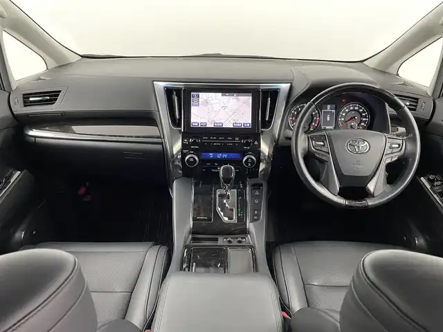 トヨタ アルファード S Cパッケージ 埼玉県 2015(平27)年 4.1万km ホワイトパールクリスタルシャイン 純正ナビ/（フルセグＴＶ・ＡＭ・ＦＭ・Ｂｌｕｅｔｏｏｔｈ）/全方位カメラ/後席フリップダウンモニター/モデリスタエアロ/ムーンルーフ/ビルトインETC/JBLサウンド/パワースライドドア（両側）/レーダークルーズコントロール/コーナーセンサー/パワーバックドア/LEDヘッドランプ/オートライト/フォグランプ/純正18インチアルミ/木目調/革巻きステアリングホイール/ステアリングヒーター/前後左右独立オートエアコン/革シート/シートヒーター/パワーシート/スマートエントリー/禁煙車