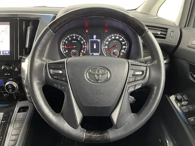 トヨタ アルファード S Cパッケージ 埼玉県 2015(平27)年 4.1万km ホワイトパールクリスタルシャイン 純正ナビ/（フルセグＴＶ・ＡＭ・ＦＭ・Ｂｌｕｅｔｏｏｔｈ）/全方位カメラ/後席フリップダウンモニター/モデリスタエアロ/ムーンルーフ/ビルトインETC/JBLサウンド/パワースライドドア（両側）/レーダークルーズコントロール/コーナーセンサー/パワーバックドア/LEDヘッドランプ/オートライト/フォグランプ/純正18インチアルミ/木目調/革巻きステアリングホイール/ステアリングヒーター/前後左右独立オートエアコン/革シート/シートヒーター/パワーシート/スマートエントリー/禁煙車