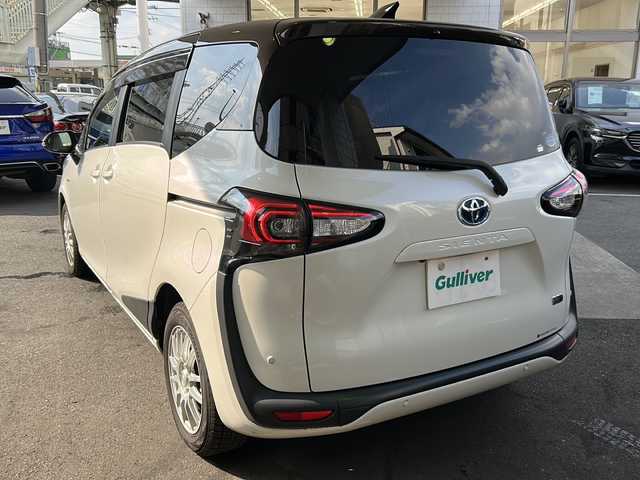 トヨタ シエンタ ハイブリッド G クエロ 京都府 2019(令1)年 7.3万km ヴィンテージブラウンパールクリスタルシャイン/ホワイトパールクリスタルシャイン 純正SDナビ /フルセグTV /トヨタセーフティセンス　/全方位カメラ　/フリップダウンモニター　/禁煙車　/両側パワスラ　/前後コーナーセンサー　/ビルトインETC2.0　/2トーン　/LEDヘッドライト/クーズコントロール/スマートキー/ハーフレザー/前席シートヒーター/前方社外ドライブレコーダー/　CSD-790FHG/（CSD-790FHG)/ウインカーミラー/アイドリングストップ/Bluetooth/CD再生機能/ウォークスルー/AW15インチ/（GRASS）/スタッドレスタイヤ/横滑り防止/レーンキープアシスト/盗難防止装置/オートライト/オートマチックハイビーム/Wエアバッグ