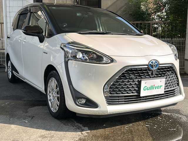 トヨタ シエンタ ハイブリッド G クエロ 京都府 2019(令1)年 7.3万km ヴィンテージブラウンパールクリスタルシャイン/ホワイトパールクリスタルシャイン 純正SDナビ /フルセグTV /トヨタセーフティセンス　/全方位カメラ　/フリップダウンモニター　/禁煙車　/両側パワスラ　/前後コーナーセンサー　/ビルトインETC2.0　/2トーン　/LEDヘッドライト/クーズコントロール/スマートキー/ハーフレザー/前席シートヒーター/前方社外ドライブレコーダー/　CSD-790FHG/（CSD-790FHG)/ウインカーミラー/アイドリングストップ/Bluetooth/CD再生機能/ウォークスルー/AW15インチ/（GRASS）/スタッドレスタイヤ/横滑り防止/レーンキープアシスト/盗難防止装置/オートライト/オートマチックハイビーム/Wエアバッグ