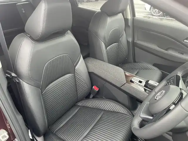 日産 オーラ G レザーエディション 愛媛県 2023(令5)年 0.7万km バーガンディー 純正9型ナビ/AM/FM/BT/フルセグTV/全周囲カメラ　/ブラインドスポットモニター　/インテリジェントルームミラー　/ドライブレコーダー　/ステアリングリモコン　/LEDヘッドライト　/前後コーナーセンサー　/電動パーキングブレーキ　/ETC/レザーシート/シガーソケット/ISOFIX/SPORT/ECO/NORMAL/EVモード/現状サマー(純正AW)(205/50/R17)/BRIDGESTONE TURANZA T005A