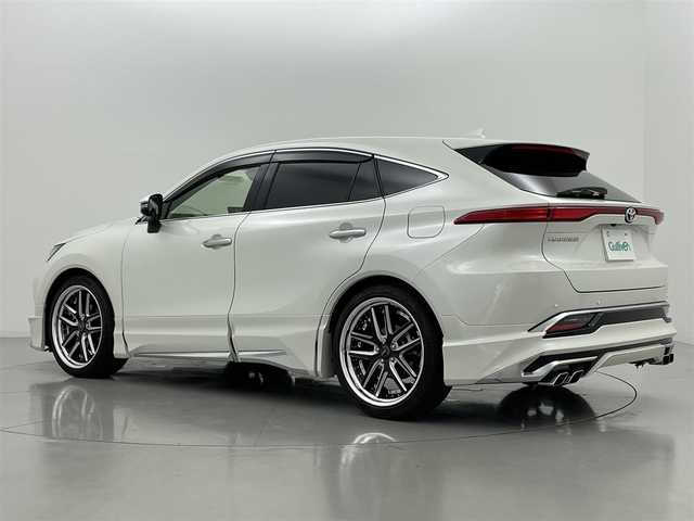 トヨタ ハリアー Z レザーパッケージ 熊本県 2022(令4)年 4.1万km ホワイトパールクリスタルシャイン モデリスタエアロフル/JBLサウンド/純正ナビ（ApplCarPlay・AndroidAuto・BT・フルセグ・USB）　/全周囲カメラ　/ビルトインＥＴＣ２．０　/前後クリアランスソナー　/録画機能付きデジタルインナーミラー/トヨタセーフティーセンス/・レーンキープアシスト/・ロードサインアシスト/・アダブティブクルーズコントロール/・オートマチックハイビーム/・駐車時支援パーキングサポートシステム/・ブラインドスポットモニター/・リアクロストラフィックアラート/・先行車発進お知らせ機能/・ヘッドアップディスプレイ/横滑り防止/前席シートヒーター/ステアリングヒーター　/前席エアーシート　/前席パワーシート/運転席シートメモリー/パワーバックドア/ＢＬＩＴＺ車高調/電動パーキングサポート/ブレーキホールド/レザーシート/社外フロアマット/社外２１インチAW/オートライト/LEDヘッドライト/フォグランプ/スマートキー/プッシュスタート/スペアキー/保証書/取扱説明書/