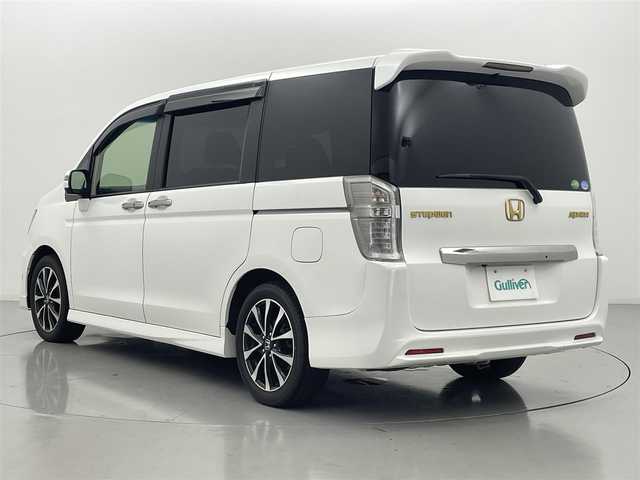 ホンダ ステップワゴン スパーダ Z クールスピリット 熊本県 2015(平27)年 7.3万km ホワイトオーキッドパール 社外ナビ（ＣＤ・ＤＶＤ・フルセグ・ＢＴ・ＳＤ・ｉｐｏｄ）/社外フリップダウンモニター/クルーズコントロール　/両側パワースライドドア　/横滑り防止　/アイドリングストップ　/パドルシフト/ハーフレザーシート　/純正フロアマット　/純正１７インチＡＷ/オートライト/HIDライト/フォグライト/スマートキー