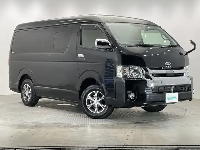 トヨタ ハイエース GL ロング 栃木県 2019(令1)年 3.4万km ブラックマイカ 4WD/11型アルパイン製ナビ(XF11Z)/(フルセグTV・Bluetooth・CD・DVD・USB・HDMI)/後席モニター/4列シート/トヨタセーフティセンス/ ・プリクラッシュセーフティ/ ・レーンキープアシスト/ ・オートハイビーム/片側パワースライドドア/バックカメラ/前後ドライブレコーダー/AC100V電源/LEDヘッドライト/オートライト/フロントフォグランプ/純正アルミホイール/純正フロアマット/スマートキー/スペアキー/保証書