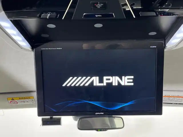 トヨタ ハイエース GL ロング 栃木県 2019(令1)年 3.4万km ブラックマイカ 4WD/11型アルパイン製ナビ(XF11Z)/(フルセグTV・Bluetooth・CD・DVD・USB・HDMI)/後席モニター/4列シート/トヨタセーフティセンス/ ・プリクラッシュセーフティ/ ・レーンキープアシスト/ ・オートハイビーム/片側パワースライドドア/バックカメラ/前後ドライブレコーダー/AC100V電源/LEDヘッドライト/オートライト/フロントフォグランプ/純正アルミホイール/純正フロアマット/スマートキー/スペアキー/保証書