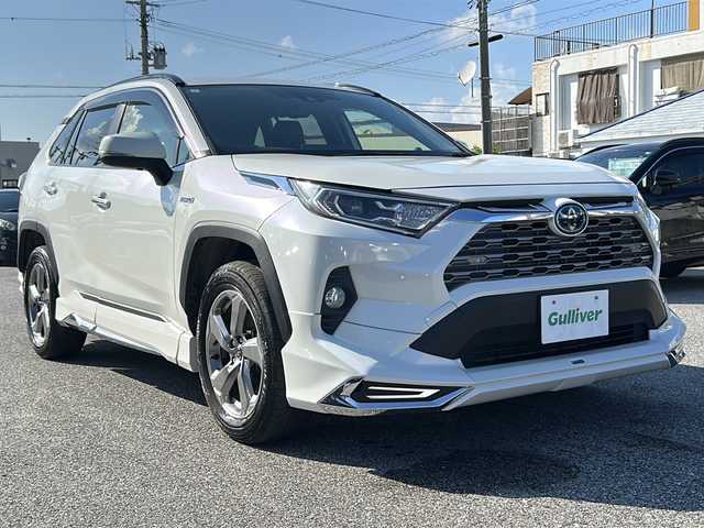 トヨタ ＲＡＶ４ ハイブリッドG 沖縄県 2019(令1)年 7.2万km パール 純正９インチナビ/（ＡＭ／ＦＭ／ＣＤ／ＤＶＤ／ＢＴ）　/フルセグＴＶ　/バックモニター　/トヨタセーフティーセンス　/電動リアゲート　/パワーシート　/純正１８インチＡＷ　/クルコン　/ドラレコ　/ＥＴＣ/オートマチックハイビーム/プッシュスタート/スマートキー/純正フロアアット