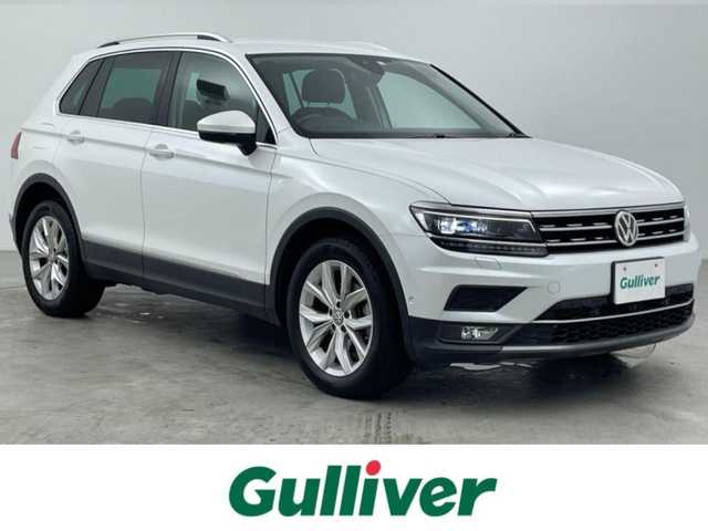 フォルクスワーゲン ティグアン TDI 4モーション ハイライン 大分県 2020(令2)年 5.4万km ピュアホワイト Volkswagen純正インフォテイメントシステム/Discover Pro/(CD、DVD、Bluetooth、AM、FM）/ETC2.0/4MOTIONアクティブコントロール/オンロード、スノー、オフロード、オフロードカスタム/Active Info Display/全席シートヒーター/ヘッドアップディスプレイ/パワーテールゲート/LEDヘッドライト/シルバールーフレール/自動防眩ルームミラー/オートライト/レインセンサー/アクティブクルーズコントール/渋滞時追従支援システム/レーンキープアシスト/レーンチェンジアシスト/ダイナミックコーナリングアシスト/スタティックコーナリングライト/ダイナミックライトアシスト/リアビューカメラ/アラウンドビューカメラ/駐車支援システム/ドライバー疲労検知システム/パークディスタンスコントロール/リアトラフィックアラート/プリクラッシュブレーキシステム/プロアクティブオキュバントプロテクション/オプティカルパーlキングシステム/ESC/パドルシフト