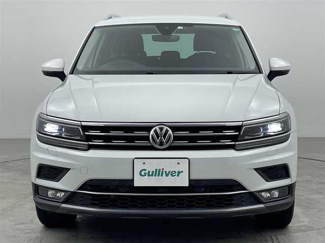 フォルクスワーゲン ティグアン TDI 4モーション ハイライン 大分県 2020(令2)年 5.4万km ピュアホワイト Volkswagen純正インフォテイメントシステム/Discover Pro/(CD、DVD、Bluetooth、AM、FM）/ETC2.0/4MOTIONアクティブコントロール/オンロード、スノー、オフロード、オフロードカスタム/Active Info Display/全席シートヒーター/ヘッドアップディスプレイ/パワーテールゲート/LEDヘッドライト/シルバールーフレール/自動防眩ルームミラー/オートライト/レインセンサー/アクティブクルーズコントール/渋滞時追従支援システム/レーンキープアシスト/レーンチェンジアシスト/ダイナミックコーナリングアシスト/スタティックコーナリングライト/ダイナミックライトアシスト/リアビューカメラ/アラウンドビューカメラ/駐車支援システム/ドライバー疲労検知システム/パークディスタンスコントロール/リアトラフィックアラート/プリクラッシュブレーキシステム/プロアクティブオキュバントプロテクション/オプティカルパーlキングシステム/ESC/パドルシフト