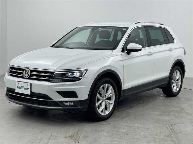 フォルクスワーゲン ティグアン TDI 4モーション ハイライン 大分県 2020(令2)年 5.4万km ピュアホワイト Volkswagen純正インフォテイメントシステム/Discover Pro/(CD、DVD、Bluetooth、AM、FM）/ETC2.0/4MOTIONアクティブコントロール/オンロード、スノー、オフロード、オフロードカスタム/Active Info Display/全席シートヒーター/ヘッドアップディスプレイ/パワーテールゲート/LEDヘッドライト/シルバールーフレール/自動防眩ルームミラー/オートライト/レインセンサー/アクティブクルーズコントール/渋滞時追従支援システム/レーンキープアシスト/レーンチェンジアシスト/ダイナミックコーナリングアシスト/スタティックコーナリングライト/ダイナミックライトアシスト/リアビューカメラ/アラウンドビューカメラ/駐車支援システム/ドライバー疲労検知システム/パークディスタンスコントロール/リアトラフィックアラート/プリクラッシュブレーキシステム/プロアクティブオキュバントプロテクション/オプティカルパーlキングシステム/ESC/パドルシフト