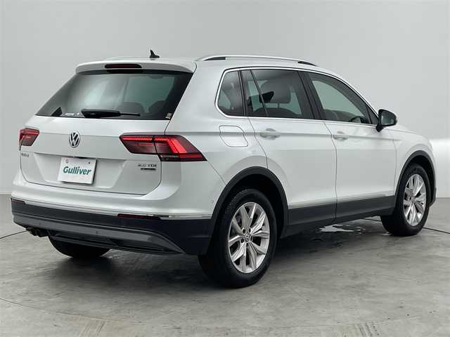 フォルクスワーゲン ティグアン TDI 4モーション ハイライン 大分県 2020(令2)年 5.4万km ピュアホワイト Volkswagen純正インフォテイメントシステム/Discover Pro/(CD、DVD、Bluetooth、AM、FM）/ETC2.0/4MOTIONアクティブコントロール/オンロード、スノー、オフロード、オフロードカスタム/Active Info Display/全席シートヒーター/ヘッドアップディスプレイ/パワーテールゲート/LEDヘッドライト/シルバールーフレール/自動防眩ルームミラー/オートライト/レインセンサー/アクティブクルーズコントール/渋滞時追従支援システム/レーンキープアシスト/レーンチェンジアシスト/ダイナミックコーナリングアシスト/スタティックコーナリングライト/ダイナミックライトアシスト/リアビューカメラ/アラウンドビューカメラ/駐車支援システム/ドライバー疲労検知システム/パークディスタンスコントロール/リアトラフィックアラート/プリクラッシュブレーキシステム/プロアクティブオキュバントプロテクション/オプティカルパーlキングシステム/ESC/パドルシフト