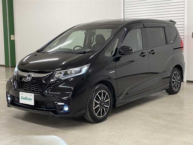 ホンダ フリード ハイブリット モデューロX ホンダセンシング 熊本県 2019(平31)年 2.3万km プレミアムスパークルブラックパール 純正ナビ（ラジオ、フルセグ、BT、CD、DVD、SD）/純正フリップダウン/ETC/ドライブレコーダー/レーダークルーズコントロール/ステアリングリモコン/両側パワスラ/バックカメラ/レーンキープ/横滑り防止/オートライト/リアサンシェード/フロアマット/ドアバイザー/プッシュスタート/スマートキー