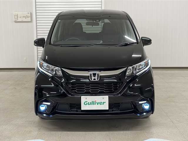 ホンダ フリード ハイブリット モデューロX ホンダセンシング 熊本県 2019(平31)年 2.3万km プレミアムスパークルブラックパール 純正ナビ（ラジオ、フルセグ、BT、CD、DVD、SD）/純正フリップダウン/ETC/ドライブレコーダー/レーダークルーズコントロール/ステアリングリモコン/両側パワスラ/バックカメラ/レーンキープ/横滑り防止/オートライト/リアサンシェード/フロアマット/ドアバイザー/プッシュスタート/スマートキー