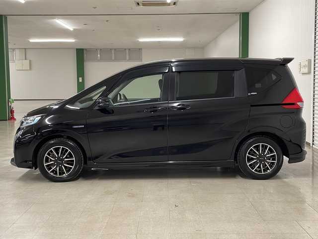 ホンダ フリード ハイブリット モデューロX ホンダセンシング 熊本県 2019(平31)年 2.3万km プレミアムスパークルブラックパール 純正ナビ（ラジオ、フルセグ、BT、CD、DVD、SD）/純正フリップダウン/ETC/ドライブレコーダー/レーダークルーズコントロール/ステアリングリモコン/両側パワスラ/バックカメラ/レーンキープ/横滑り防止/オートライト/リアサンシェード/フロアマット/ドアバイザー/プッシュスタート/スマートキー