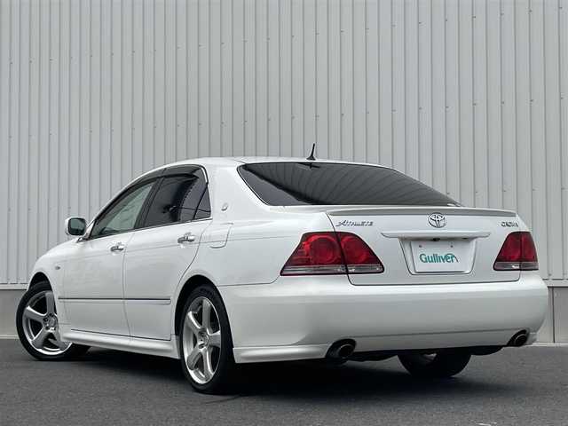トヨタ クラウン アスリート プレミアム 50th ED 群馬県 2005(平17)年 7.3万km ホワイトパールクリスタルシャイン サンルーフ/純正DVDナビ/（CD/MD/Bluetooth/AM/FM）/バックカメラ/黒革シート/シートヒーター/パワーシート/シートメモリー/HIDヘッドライト/クルーズコントロール/ステアリングリモコン/ETC/社外18インチアルミホイール/保証書/取扱説明書/スペアキー