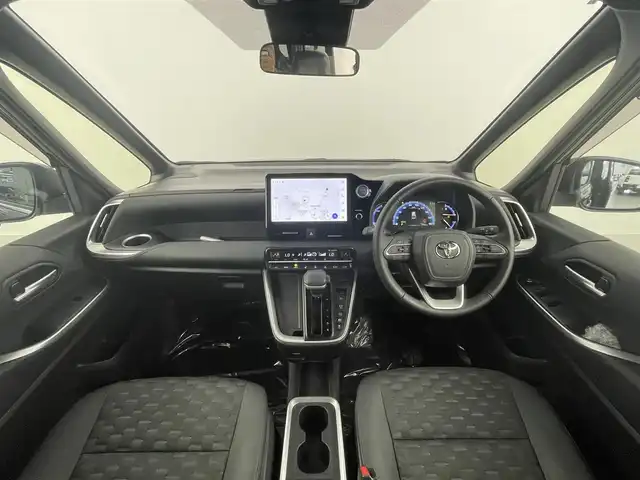 トヨタ ヴォクシー ハイブリッド S－Z 埼玉県 2022(令4)年 4.5万km グリッターブラックガラスフレーク 純正ナビ　ＣＤ／ＤＶＤ　純正１４型後席モニター　オットマン 100V電源 シートヒーター　電動リアゲート　両側パワースライドドア　ハーフレザーシート　レーダークルーズコントロール　ビルトインＥＴＣ
