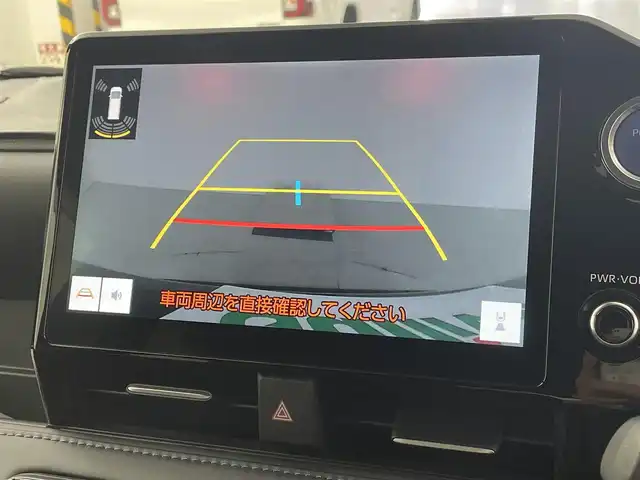 トヨタ ヴォクシー ハイブリッド S－Z 埼玉県 2022(令4)年 4.5万km グリッターブラックガラスフレーク 純正ナビ　ＣＤ／ＤＶＤ　純正１４型後席モニター　オットマン 100V電源 シートヒーター　電動リアゲート　両側パワースライドドア　ハーフレザーシート　レーダークルーズコントロール　ビルトインＥＴＣ