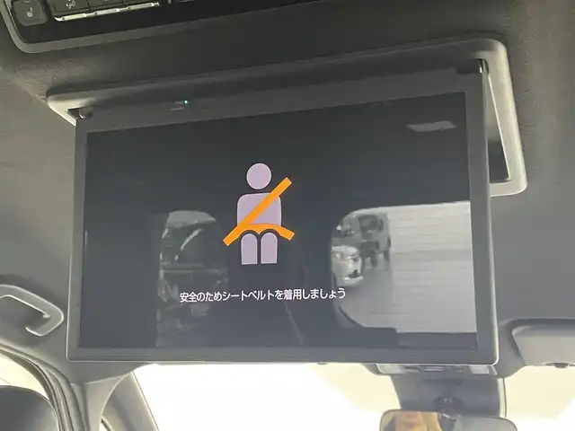 トヨタ ヴォクシー ハイブリッド S－Z 埼玉県 2022(令4)年 4.5万km グリッターブラックガラスフレーク 純正ナビ　ＣＤ／ＤＶＤ　純正１４型後席モニター　オットマン 100V電源 シートヒーター　電動リアゲート　両側パワースライドドア　ハーフレザーシート　レーダークルーズコントロール　ビルトインＥＴＣ