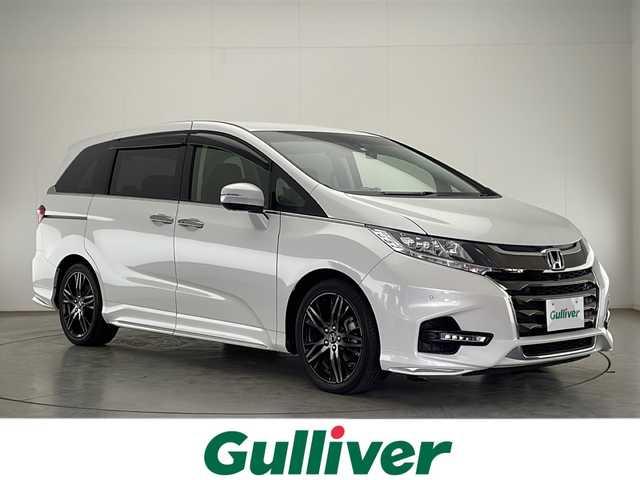 ホンダ オデッセイ アブソルート・EXホンダセンジング 宮崎県 2020(令2)年 2.1万km プラチナホワイトパール 禁煙車/ホンダセンシング/純正9型ナビTV/（VXM-207VFNi/CD/DVD/Bluetooth/フルセグTV)/純正ビルトイン2.0ETC/純正18インチアルミ/純正LEDオートライト/純正LEDフォグ/純正フロアマット/社外前後ドライブレコーダー/社外GPSオービスレーダー/両側電動スライドドア/アダプティブクルーズコントロール/レーンディパーチャーアラート/ブラインドスポットモニター/クリアランスソナー/パドルシフト/本革巻ハンドル/前席パワーシート/シートヒーター/ハーフレザーシート/ウインカードアミラー/スマートキー/プッシュエンジンスタート/新車時保証書/取扱い説明書