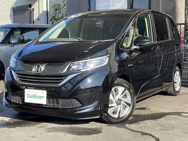 ホンダ フリード ハイブリット G ホンダセンシング 京都府 2019(令1)年 3.4万km プレミアムスパークルブラックパール 純正SDナビ/  GathersVXM-194VFi/AM/FM/CD/DVD/Bluetooth/AUX/iPod/フルセグTV/　(走行視聴不可)/バックカメラ/USB入力端子/オートエアコン/両側電動スライドドア/レーダークルーズコントロール/ホンダセンシング/誤発進抑制機能/歩行者事故低減ステアリング/車線維持支援システム/路外逸脱抑制機能/先行車発進お知らせ機能/標識認識機能/LEDヘッドライト/ビルトインETC/ウィンカーミラー/ウォークスルー/3列シート/社外フロアマット/センターテーブル/Cパッケージ/ロールサンシェード/プラズマクラスター/コンフォートビューパッケージ/ヒーテッドドアミラー/熱線入りフロントウィンド/盗難防止装置/オートライト/Wエアバッグ/ECON/電動格納ミラー/取扱説明書/保証書