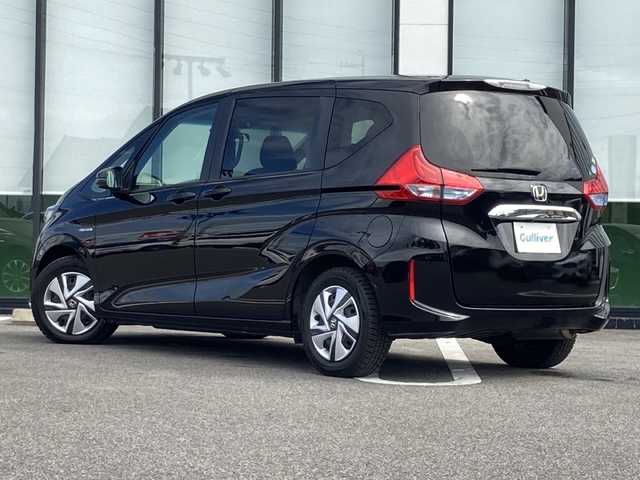 ホンダ フリード ハイブリット G ホンダセンシング 千葉県 2019(令1)年 3.4万km プレミアムスパークルブラックパール 登録時走行距離33413km/純正7型SDナビ（VXM-194VFi）/AM/FM/CD/DVD/Bluetooth/AUX/iPod/フルセグTV/　(走行視聴不可)/バックカメラ/USB入力端子/オートエアコン/両側電動スライドドア/レーダークルーズコントロール/ホンダセンシング/誤発進抑制機能/歩行者事故低減ステアリング/車線維持支援システム/路外逸脱抑制機能/先行車発進お知らせ機能/標識認識機能/LEDヘッドライト/ビルトインETC/ウィンカーミラー/ウォークスルー/3列シート/社外フロアマット/センターテーブル/Cパッケージ/ロールサンシェード/プラズマクラスター/コンフォートビューパッケージ/ヒーテッドドアミラー/熱線入りフロントウィンド/盗難防止装置/オートライト/Wエアバッグ/ECON/電動格納ミラー/取扱説明書/保証書