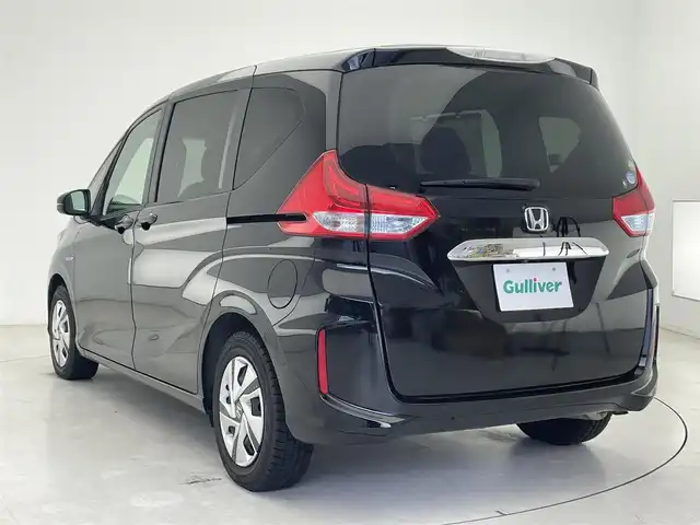 ホンダ フリード ハイブリット G ホンダセンシング 千葉県 2019(令1)年 3.4万km プレミアムスパークルブラックパール 純正7型SDナビ/フルセグTV/Bluetooth/CD/DVD/バックカメラ/USB入力端子/両側電動スライドドア/レーダークルーズコントロール/ホンダセンシング/誤発進抑制機能/歩行者事故低減ステアリング/車線維持支援システム/路外逸脱抑制機能/先行車発進お知らせ機能/標識認識機能/LEDヘッドライト/ビルトインETC/ウィンカーミラー/ウォークスルー/社外フロアマット/ロールサンシェード/プラズマクラスター/コンフォートビューパッケージ/ヒーテッドドアミラー/ワイパーデアイサー