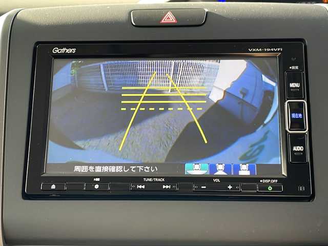 ホンダ フリード ハイブリット G ホンダセンシング 千葉県 2019(令1)年 3.4万km プレミアムスパークルブラックパール 登録時走行距離33413km/純正7型SDナビ（VXM-194VFi）/AM/FM/CD/DVD/Bluetooth/AUX/iPod/フルセグTV/　(走行視聴不可)/バックカメラ/USB入力端子/オートエアコン/両側電動スライドドア/レーダークルーズコントロール/ホンダセンシング/誤発進抑制機能/歩行者事故低減ステアリング/車線維持支援システム/路外逸脱抑制機能/先行車発進お知らせ機能/標識認識機能/LEDヘッドライト/ビルトインETC/ウィンカーミラー/ウォークスルー/3列シート/社外フロアマット/センターテーブル/Cパッケージ/ロールサンシェード/プラズマクラスター/コンフォートビューパッケージ/ヒーテッドドアミラー/熱線入りフロントウィンド/盗難防止装置/オートライト/Wエアバッグ/ECON/電動格納ミラー/取扱説明書/保証書