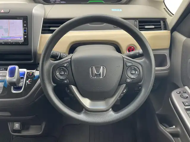 ホンダ フリード ハイブリット G ホンダセンシング 千葉県 2019(令1)年 3.4万km プレミアムスパークルブラックパール 純正7型SDナビ/フルセグTV/Bluetooth/CD/DVD/バックカメラ/USB入力端子/両側電動スライドドア/レーダークルーズコントロール/ホンダセンシング/誤発進抑制機能/歩行者事故低減ステアリング/車線維持支援システム/路外逸脱抑制機能/先行車発進お知らせ機能/標識認識機能/LEDヘッドライト/ビルトインETC/ウィンカーミラー/ウォークスルー/社外フロアマット/ロールサンシェード/プラズマクラスター/コンフォートビューパッケージ/ヒーテッドドアミラー/ワイパーデアイサー