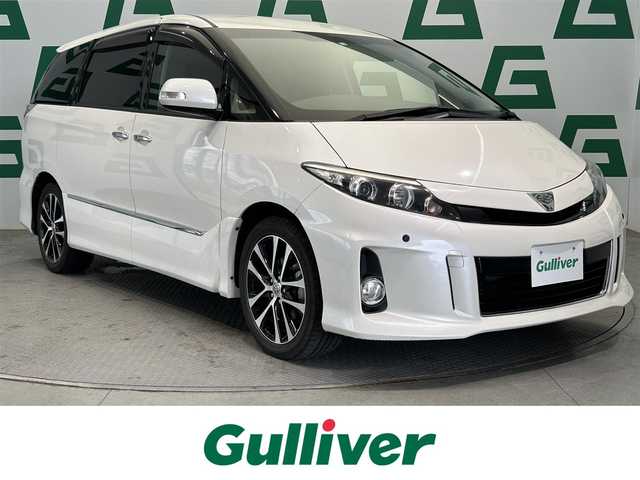 トヨタ エスティマ アエラス プレミアムエディション 鹿児島県 2016(平28)年 8万km ホワイトパールクリスタルシャイン トヨタセーフティセンスC/純正フリップダウンモニター/エンジンスターター/バックカメラ/純正SDナビ/（CD/DVD/フルセグ/Bluetooth/SD）/ETC/両側パワースライドドア/革巻きステアリング/ステアリングリモコン/ハーフレザーシート/2列目オットマン/運転席パワーシート/純正HIDヘッドライト/オートライト/純正18インチアルミホイール