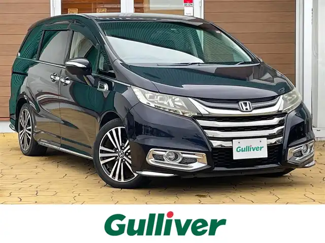 ホンダ オデッセイ アブソルート EX 宮崎県 2014(平26)年 7.1万km プレミアムヴィーナスブラックP ブラインドスポットインフォメーション/クルーズコントロール/純正ナビ/・バックカメラ/・フルセグTV/BT/CD/DVD/純正18インチAW/両側パワースライドドア/ハーフレザーシート/パワーシート/オットマン/LEDヘッドライト/オートライト/フォグランプ/パドルシフト/ETC/プッシュスタート