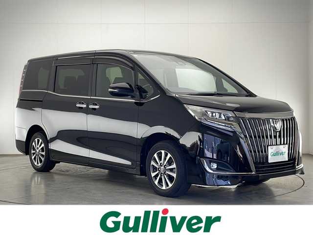 トヨタ エスクァイア Gi プレミアムパッケージ ブラックテーラード 宮崎県 2019(令1)年 3.5万km ブラック 禁煙車/トヨタセーフティセンス/純正10型ナビTV/（NSZN-Z68T/CD/DVD/Bluetooth/フルセグTV)/純正12.1型リアフリップダウンモニター/（V12T-R68C）/純正ビルトインETC/純正LEDオートエアコン/純正LEDフォグ/純正15インチアルミ/純正フロアマット/両側電動スライドドア/クルーズコントロール/レーンディパーチャーアラート/オートマチックハイビーム/前席シートヒーター/ハーフレザーシート/Wオートエアコン/ウッドコンビ本革巻ハンドル/ウインカードアミラー/スマートキー/プッシュエンジンスタート/新車時保証書/取扱い説明書