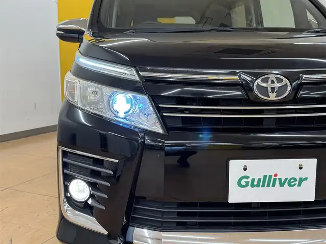 トヨタ ヴォクシー ZS 煌 群馬県 2015(平27)年 8.5万km ブラック 安全装備/・オートライト/・横滑り防止/社外10インチデカナビ/・AM/FM/Bluetooth/・CD/DVD/フルセグTV/バックカメラ/両側電動スライドドア/LEDヘッドライト/フォグランプ/ETC/純正ドアバイザー/純正16インチアルミホイール/スマートキー/プッシュスタート